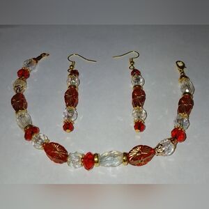 NWT Handcrafted Ruby Red, Gold, Clear Acrylice Beaded Bracelet.
